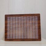 wooden 800,000 saving box with target chart