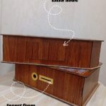 wooden 800,000 saving box with target chart