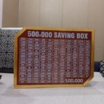 wooden 500,000 pkr saving box with chart