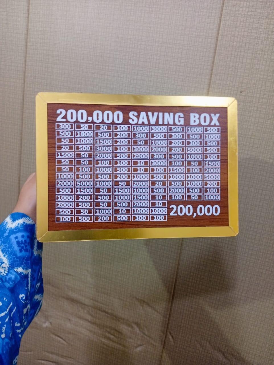 wooden 200,000 rupee saving box with slots