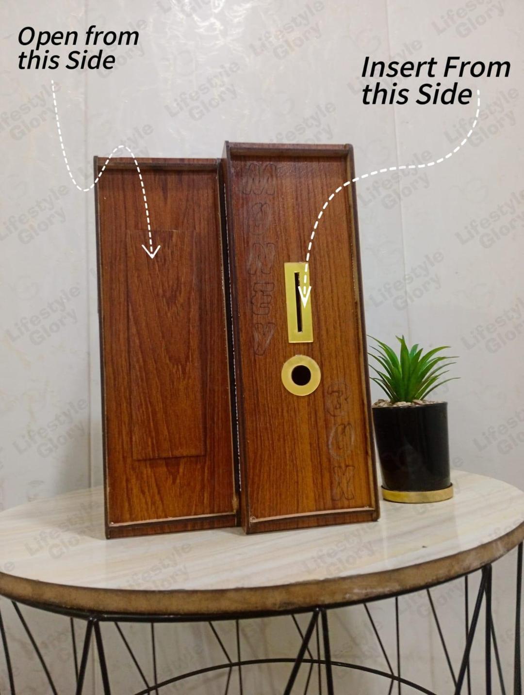 wooden 200,000 rupee saving box with slots